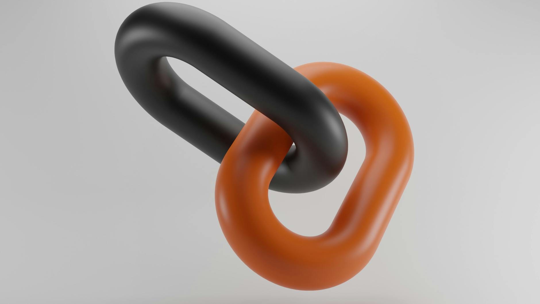 pengaruh external link ke SEO - Conceptual image of two linked chains in black and orange, symbolizing connection and strength.