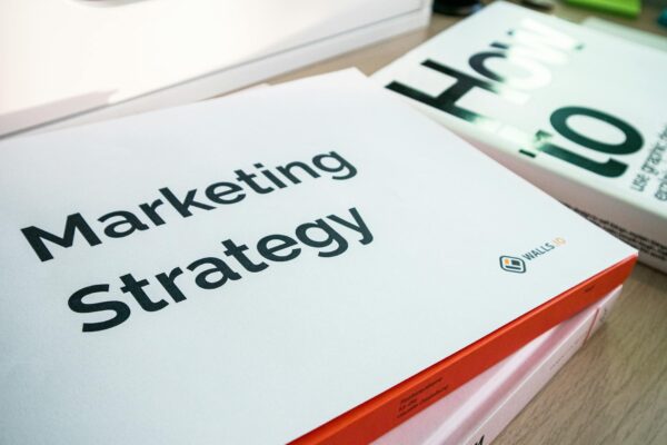 strategi international SEO - A detailed view of marketing strategy documents with close focus on text, ideal for business and finance content.