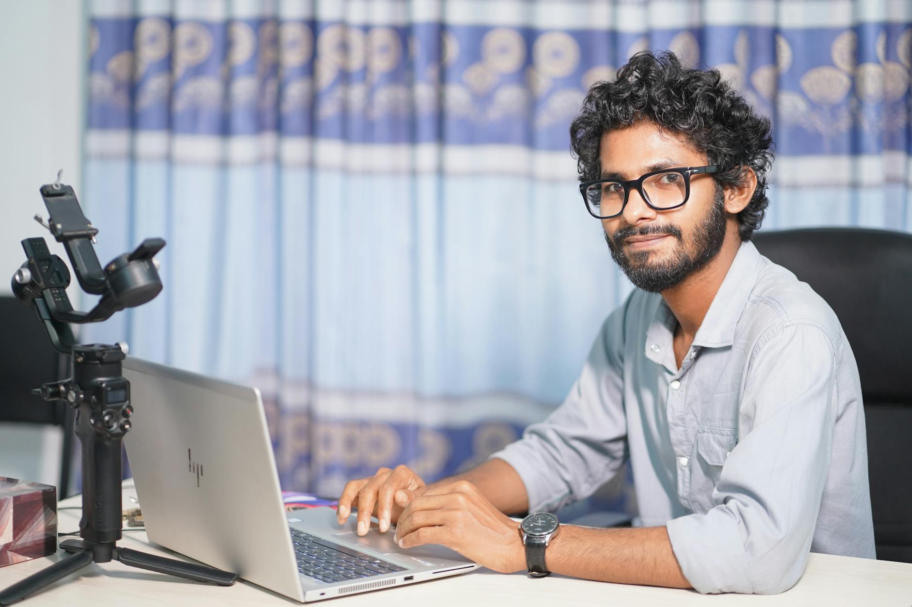 professional Core Web Vitals audit - Portrait of a web developer working on a laptop, showcasing technical and professional skills.