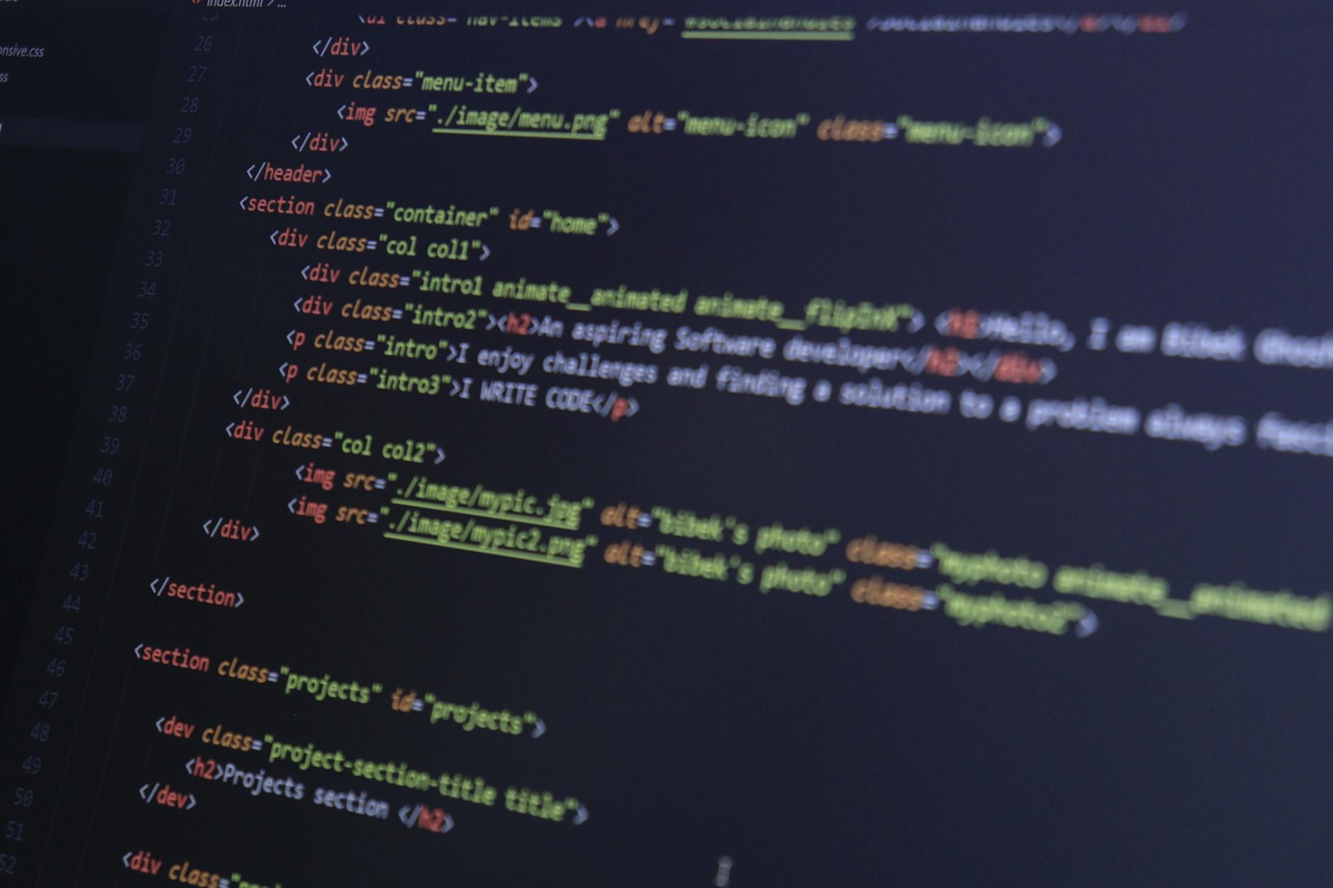 optimizing core web vitals - HTML and CSS code on a computer monitor, highlighting web development and programming.
